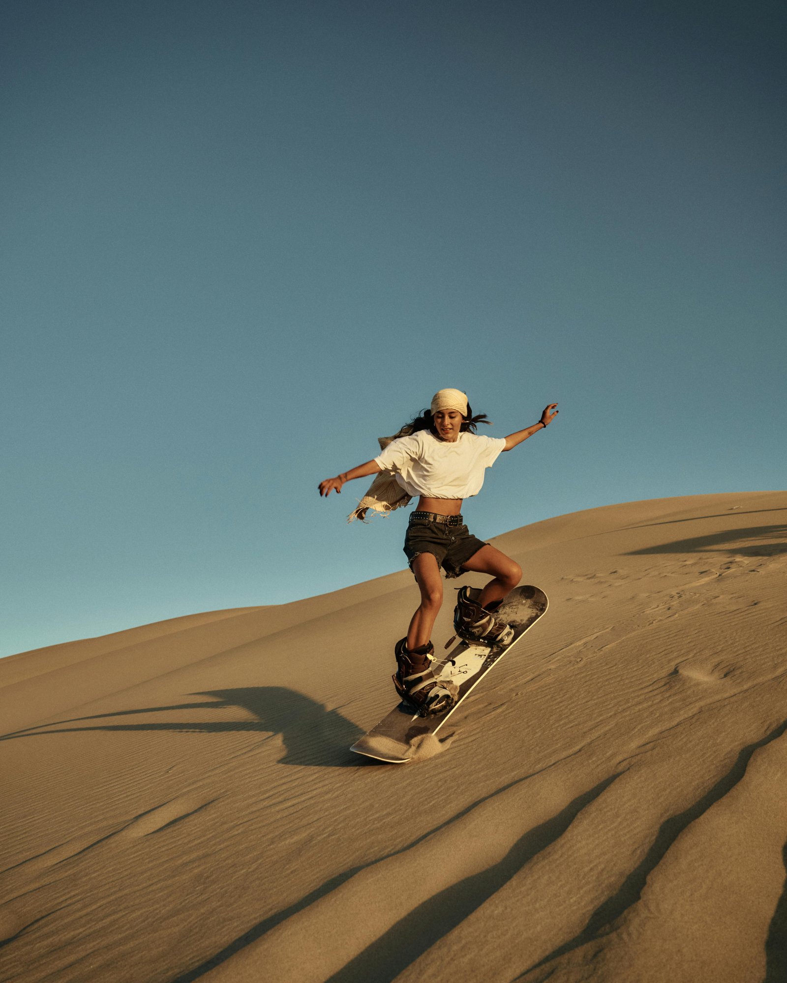 Sandboarding at dusk